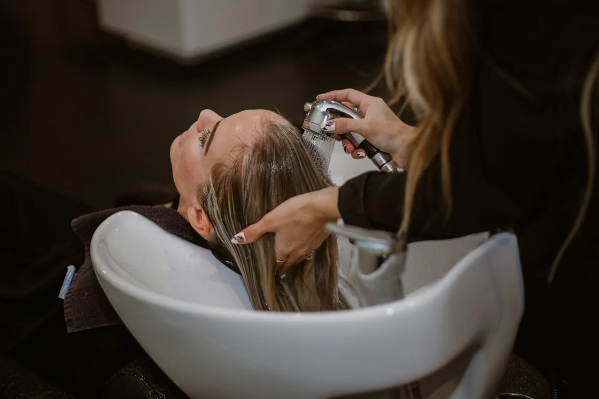 A hairdresser at work in a salon